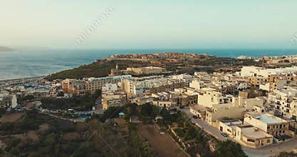 Scenic Aerial View of Hondoq Qala Gozo Malta with Coastal Resorts Pools