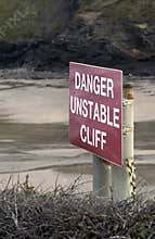 Danger unstable cliff