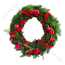 Green christmas wreath with red decorations
