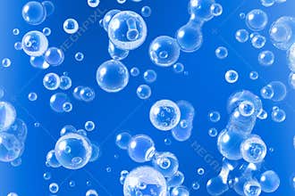 Air bubbles in blue water
