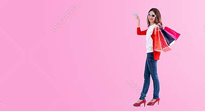 Young happy summer shopping woman with credit card
