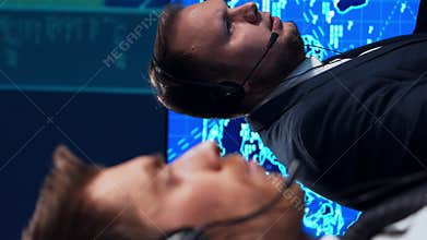 Workplace of the air traffic controllers in the control tower. Team of professional aircraft control officers works