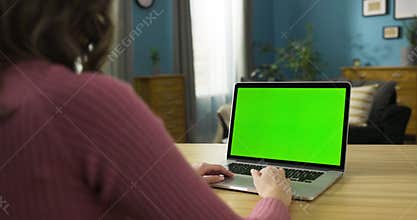 Aspiring chef or food blogger, using the tablet to follow recipe videos, search for culinary inspiration, or share her