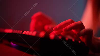 Closeup hands of female engineer developing software app using digital desktop computer tasks sitting in remote dark