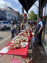 Selling Plates and Cups at the 21st Annual Georgetown French Market