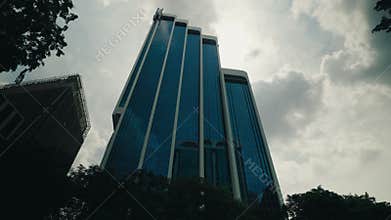 Bottom view of the Big Glass Business Centre with Many Glasses. Financial District. Skyscape and Cityscape in Big City