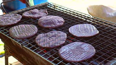 Grilling steamed Black Rice Pounded with Perilla sesame Chiangmai Thailand highland tribe famous food Southeast Asia