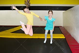 Kids Jumping on Indoor Trampolines