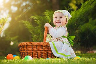Baby in basket in the green park