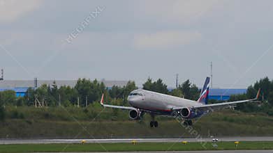 Airbus A321 of Aeroflot landing, touching the runway