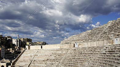 Roman Theatre in Amman, Jordan. Against the sky with clouds. 4K, time lapse