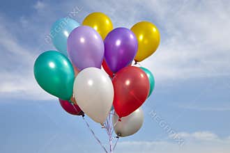 Colorful ballons in a blue sky