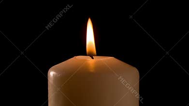 Burning candle in the dark, looped