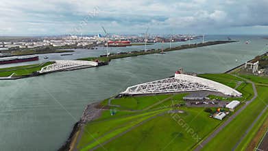 The Maeslantkering, or Maeslant barrier, is a storm barrier in the Rhine Delta in the Netherlands for flood protection