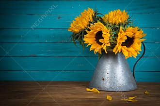 Sunflower in metal vase