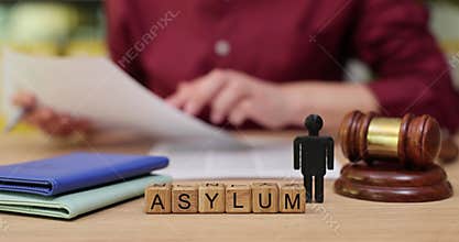 Exploring the process of seeking asylum with documents, tools, and careful preparation in a legal setting