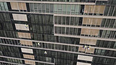 Glass facade skyscrapper window cleaners