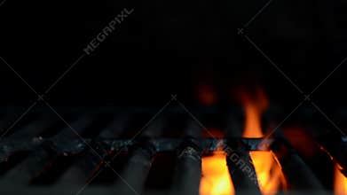 Flames Flicker on a Backyard Grill