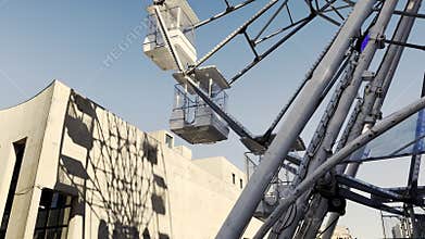 Close-up view of a Ferris wheel in motion, with