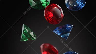 Assorted Gems Spinning on a Black Surface During the Day