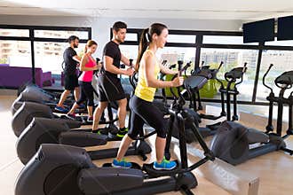 Aerobics elliptical walker trainer group at gym