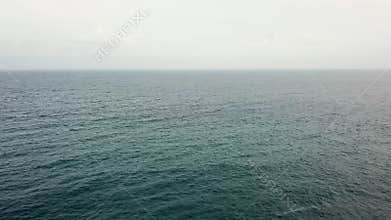 A drone shot from above of the bay of Cala Santanya and the Mediterranean Sea