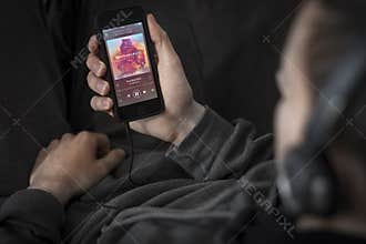 Listening to the music with Spotify app using iPhone 5s