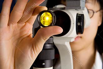 Eye Doctor examing your eyes