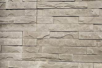 Stone wall texture with modern stacked tiles
