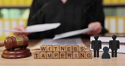 Courtroom drama unfolds as a judge addresses witness tampering in a serious legal discussion