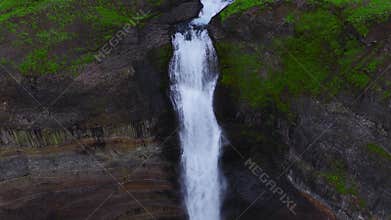 Aerial view of Haifoss waterfall in a basalt canyon in Iceland