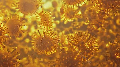 Microscopic view of virus particles in amber light