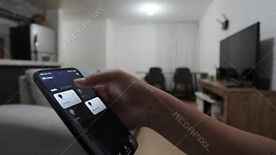 Setting Up Smart Light Bulb in Modern Purple Living Room.