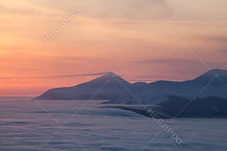 Peaks above clouds