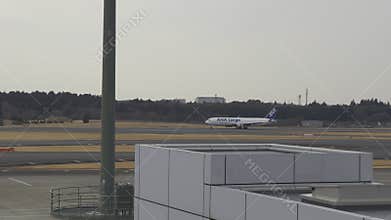 ANA Cargo Boeing 767-300ER widebody aircraft taxiing on the runway at Haneda Airport Tokyo Japan
