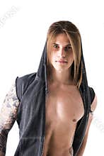 Beautiful young long haired man in hoodie jacket posing