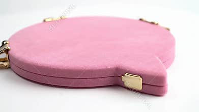 Elegant Circular Pink Clutch Purse Featuring Gold-Toned Corners and Luxurious Clasp Mechanism