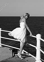 Fashionable woman by sea