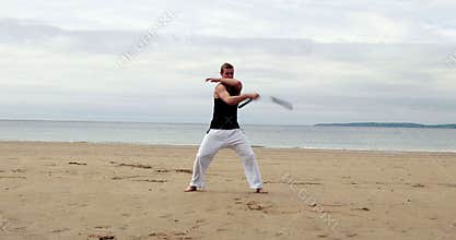 Fit man practicing martial arts