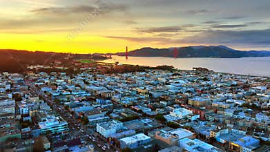 Golden Gate Bridge view from San Francisco hills at sunset