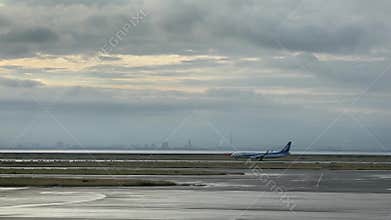 ANA Passenger Plane Taxiing on Wet Runway at Kansai International Airport Osaka 20.10.2025 Japan