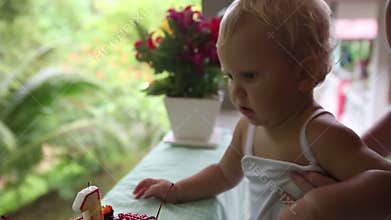 Child first saw cake for my birthday for a year with cherries with candle