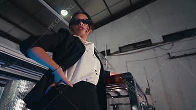 Low Angle Shot of a Powerful Woman on a Forklift