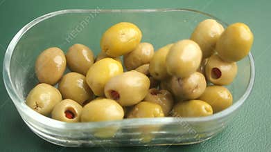 Enjoying marinated olives at a local gathering
