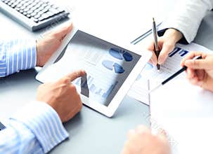 Business adviser analyzing financial figures