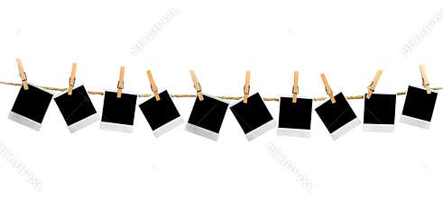 Mutiple Blank Polaroid Frames Hanging by Clothesp