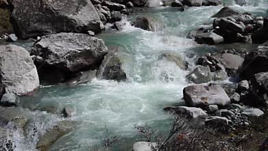 Original sound of water, flowing Ala-Archa River. Boulders and rugged landscape, mountain. Climbing, backpacking, alpine trekking