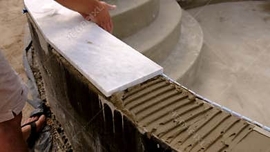 laying tiles and mosaics. Selective focus.