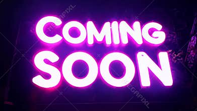 Coming Soon Announcement With Bright Neon Blue Glowing Letters