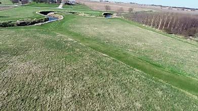 Aerial view flyover agriculture fields and farmland in Illinois corn belt - Midwest America